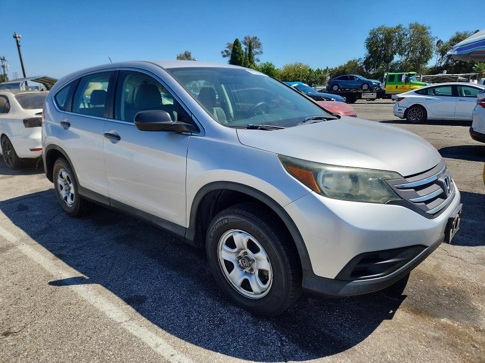 Photo 4 from auction – 2014 HONDA CR-V with VIN 3CZRM3H32EG700448