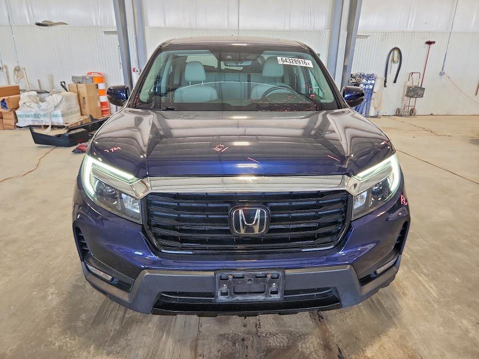 Photo 5 from auction – 2022 HONDA RIDGELINE with VIN 5FPYK3F70NB015231