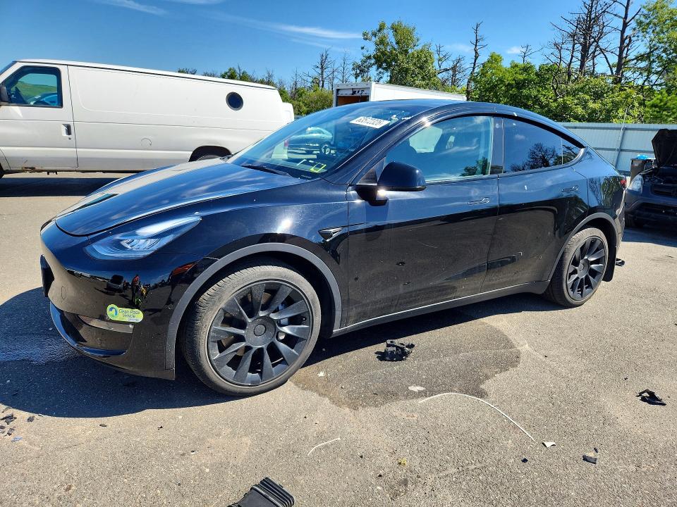 TESLA MODEL Y 2022 with VIN 7SAYGDEE2NA007518 - Photo from auction