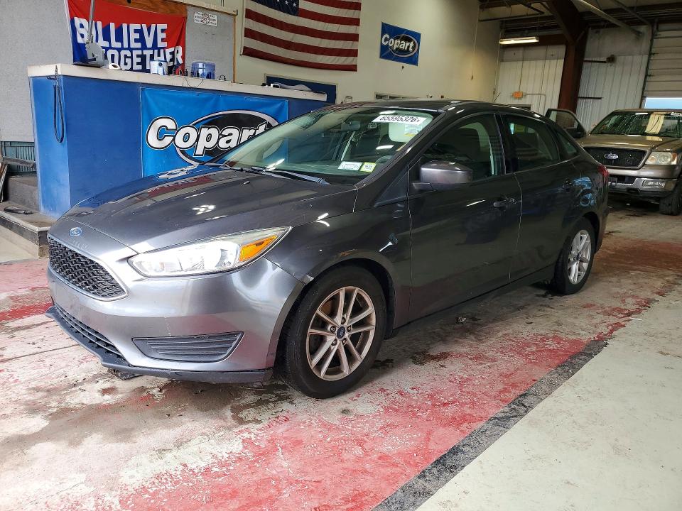 FORD FOCUS 2018 with VIN 1FADP3F26JL315981 - Photo from auction