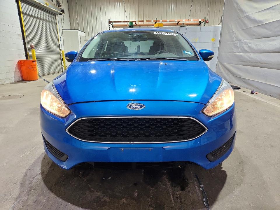 Photo 5 from auction – 2016 FORD FOCUS with VIN 1FADP3F23GL248118