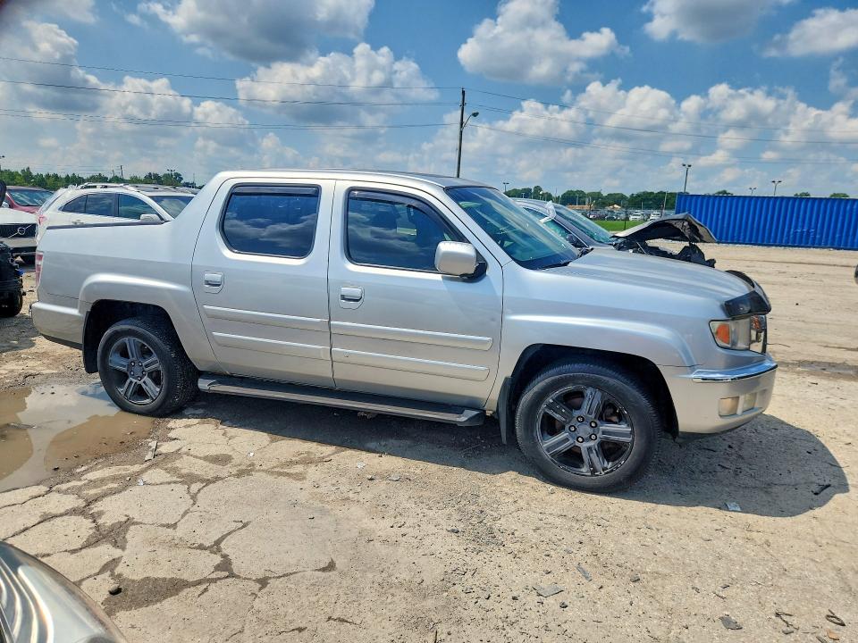 Photo 4 from auction – 2011 HONDA RIDGELINE with VIN 5FPYK1F56BB004099