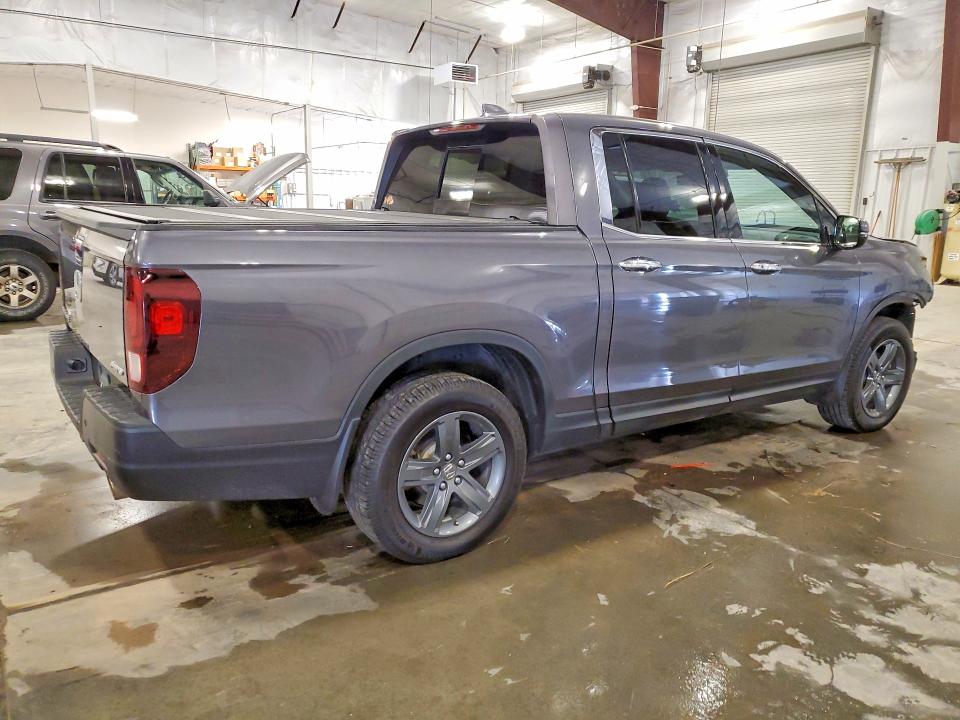 Photo 3 from auction – 2023 HONDA RIDGELINE with VIN 5FPYK3F76PB003572