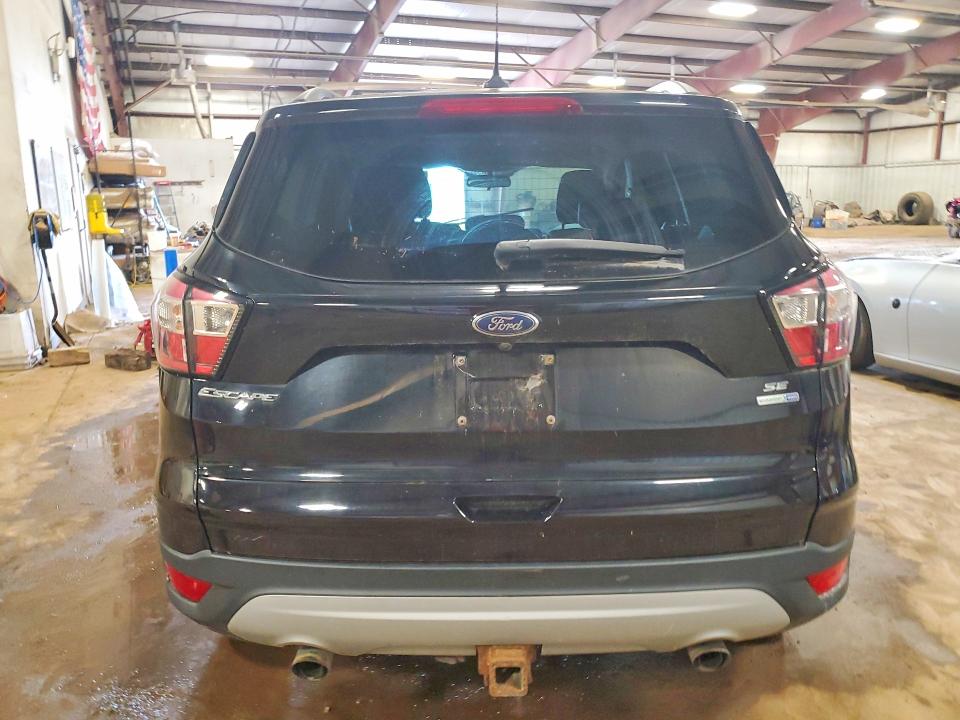 Photo 6 from auction – 2018 FORD ESCAPE with VIN 1FMCU9GD1JUC46673