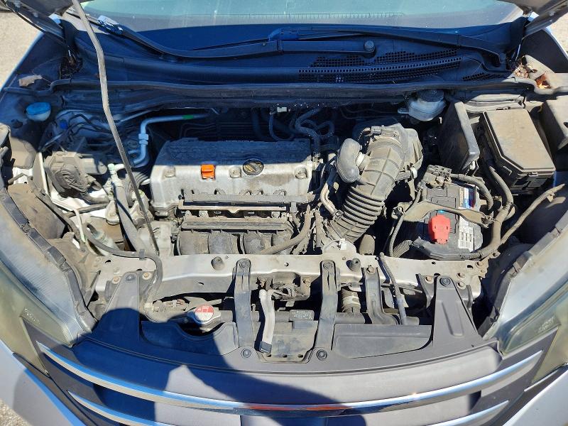 Photo 12 from auction – 2014 HONDA CR-V with VIN 3CZRM3H32EG700448