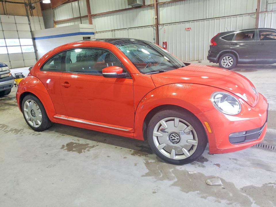 Photo 4 from auction – 2016 VOLKSWAGEN BEETLE with VIN 3VWJ17AT5GM617773