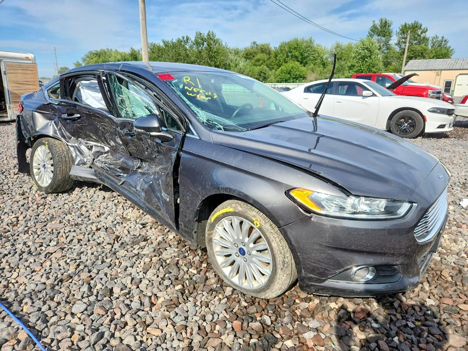 Photo 4 from auction – 2016 FORD FUSION with VIN 3FA6P0PU9GR213690