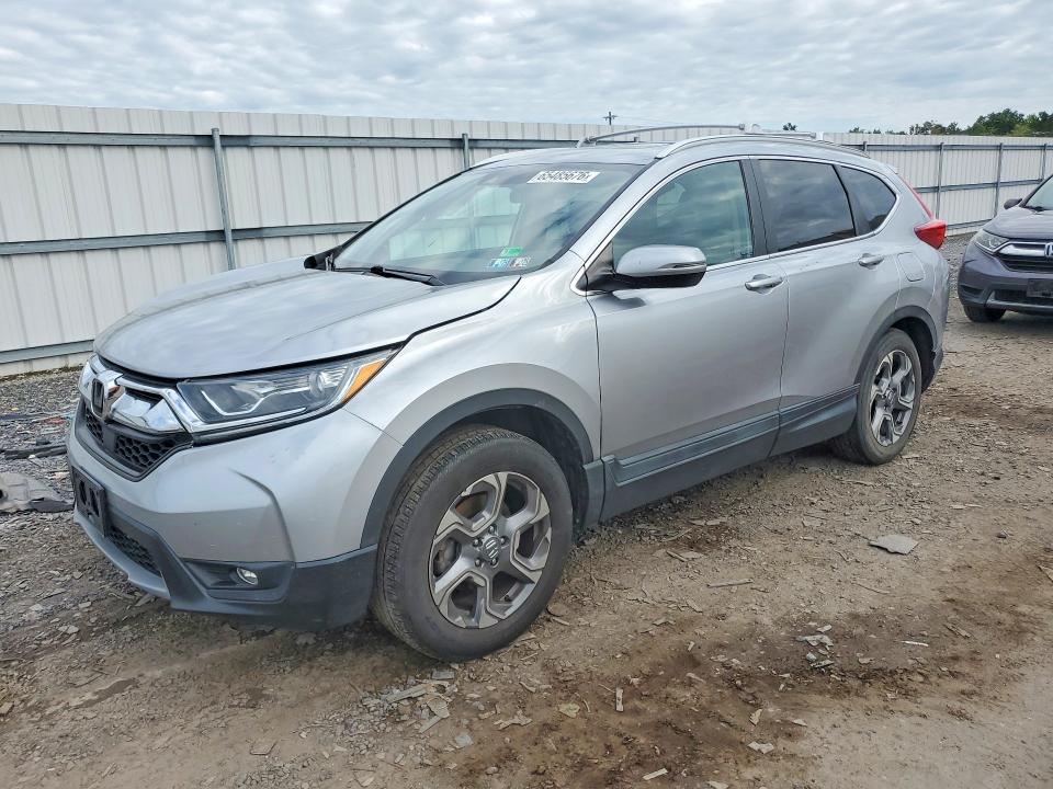 Photo 1 from auction – 2017 HONDA CR-V with VIN 2HKRW2H59HH656777