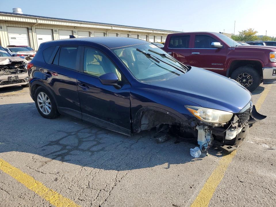 Photo 4 from auction – 2014 MAZDA CX-5 with VIN JM3KE2CY7E0384008