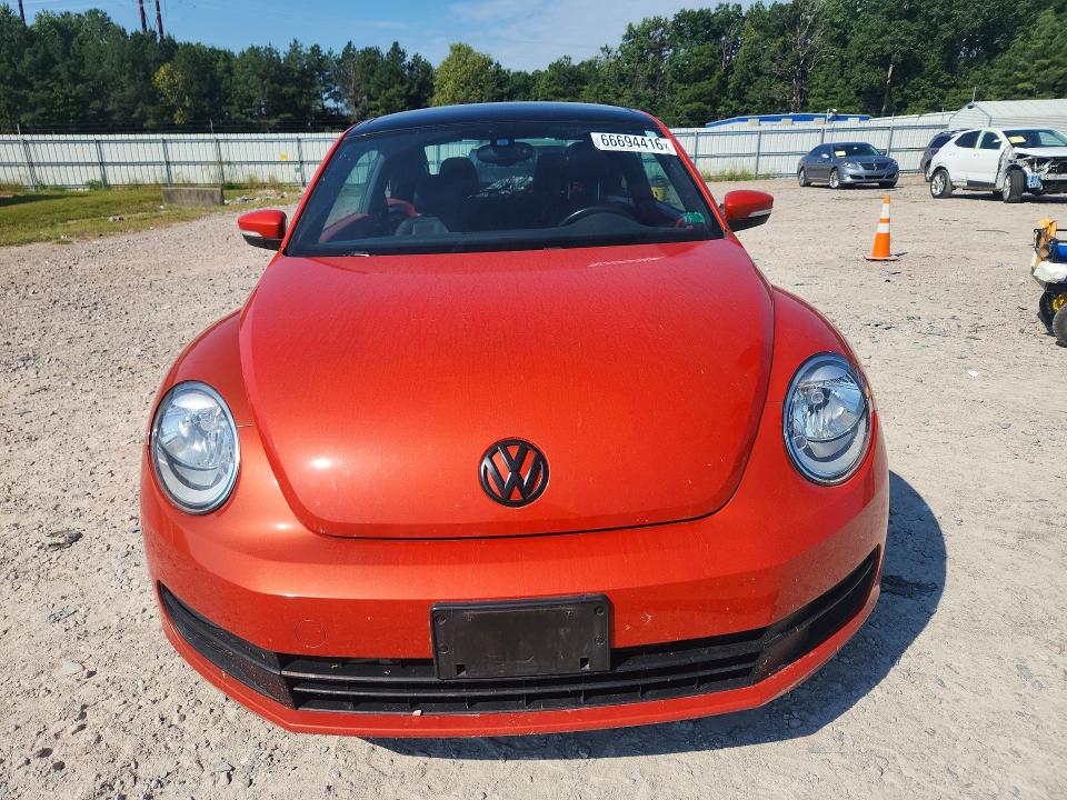 Photo 5 from auction – 2016 VOLKSWAGEN BEETLE with VIN 3VWJ17ATXGM630583