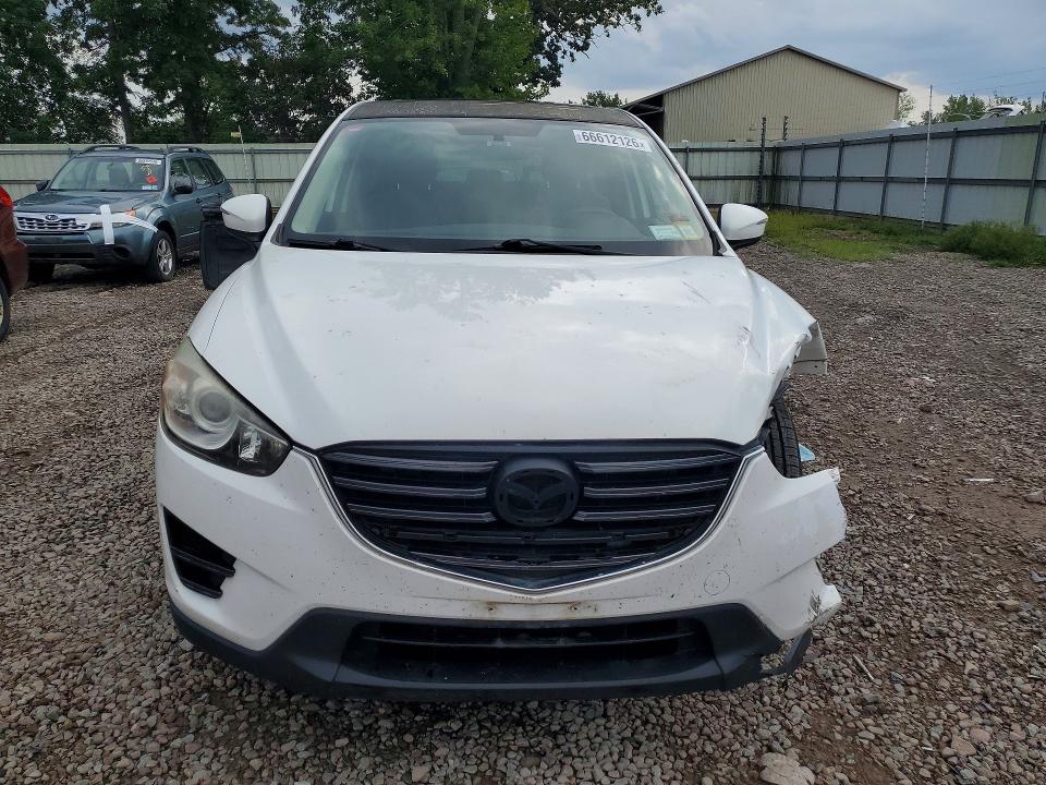 Photo 5 from auction – 2016 MAZDA CX-5 with VIN JM3KE4BY1G0764512