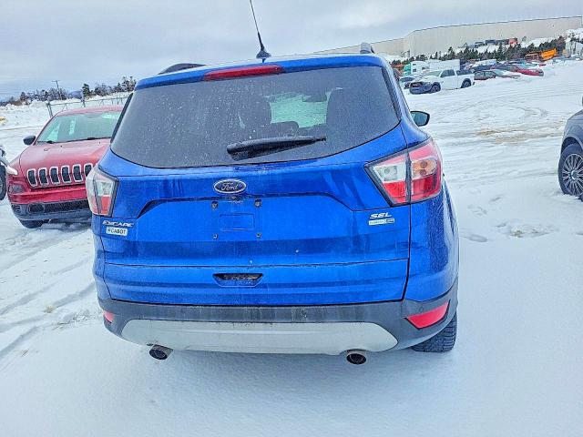 Photo 6 from auction – 2018 FORD ESCAPE with VIN 1FMCU9HD4JUC14105