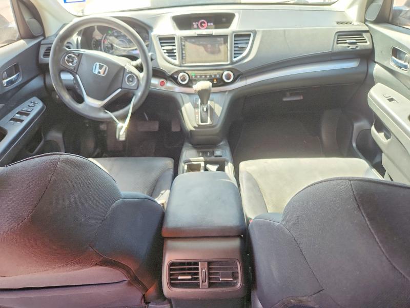 Photo 8 from auction – 2015 HONDA CR-V with VIN 3CZRM3H59FG703236