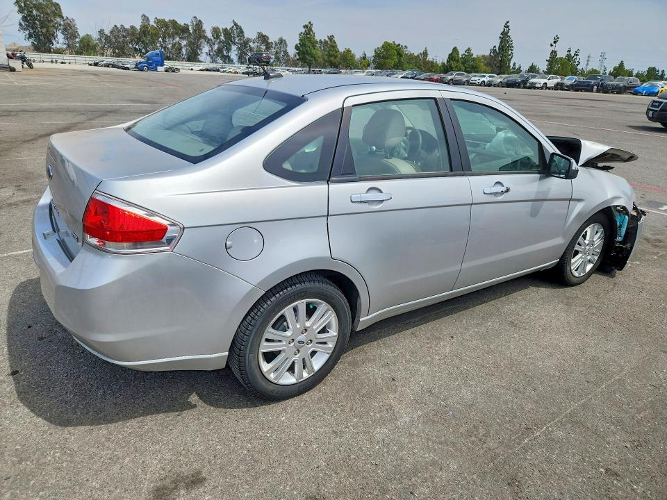 Photo 3 from auction – 2010 FORD FOCUS with VIN 1FAHP3HN1AW292262