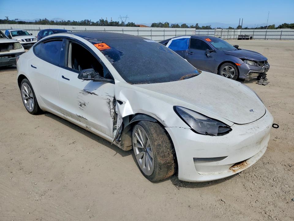 Photo 4 from auction – 2022 TESLA MODEL 3 with VIN 5YJ3E1EB9NF247542