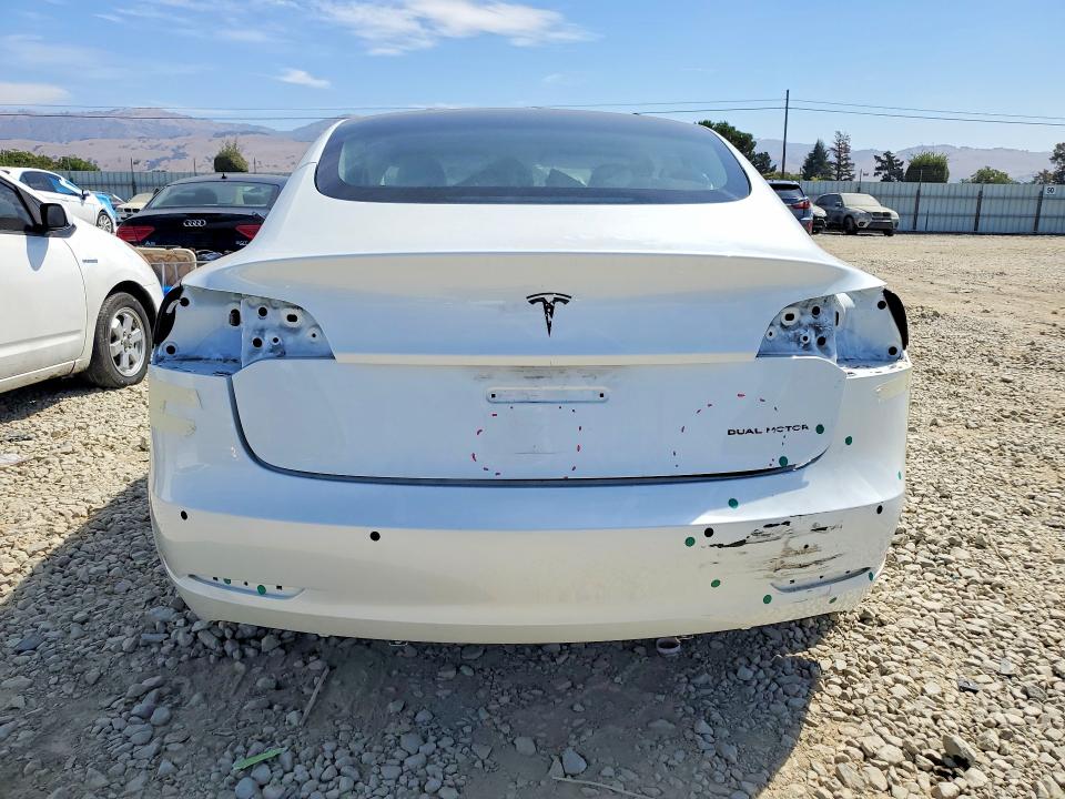 Снимка 6 от търг – 2022 TESLA MODEL 3 с VIN 5YJ3E1EB5NF144473