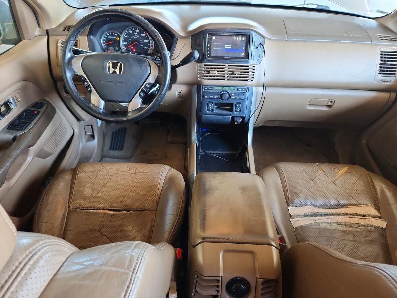 Photo 8 from auction – 2004 HONDA PILOT with VIN 2HKYF18504H518707