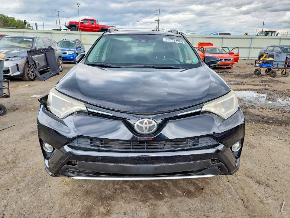 Photo 5 from auction – 2016 TOYOTA RAV4 with VIN 2T3RFREV8GW474055