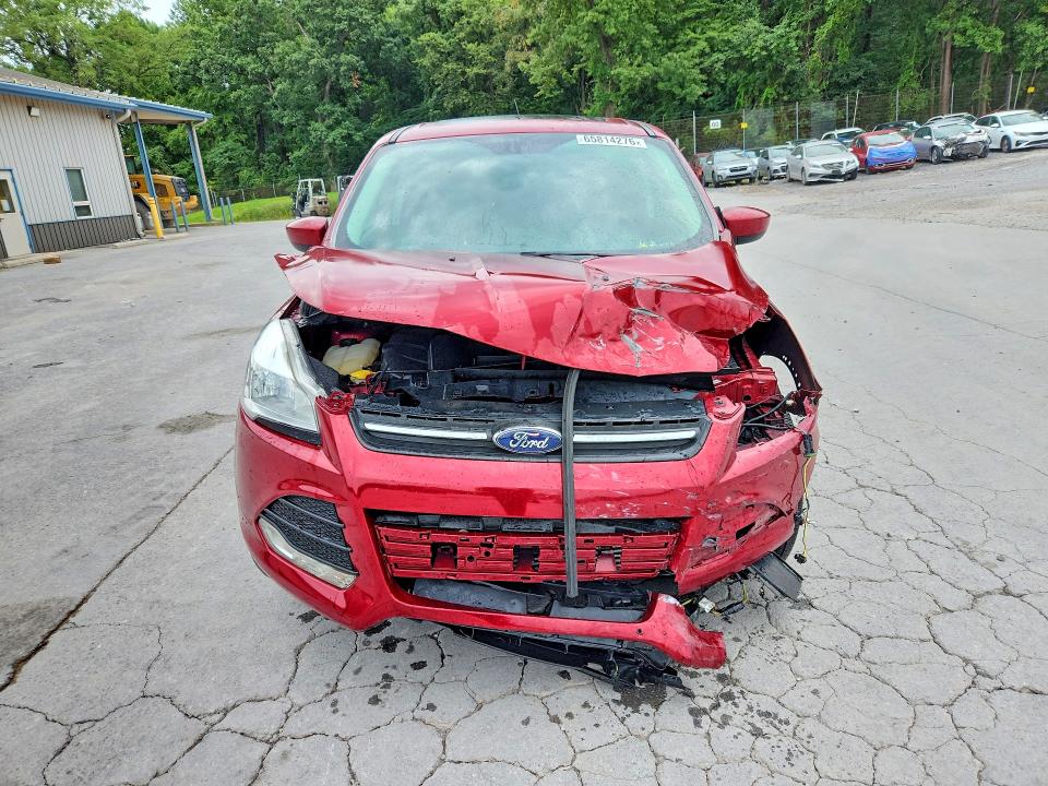 Photo 5 from auction – 2016 FORD ESCAPE with VIN 1FMCU9G97GUA02806