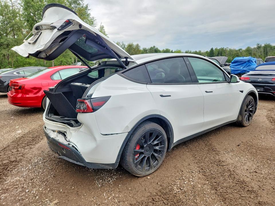 Photo 3 from auction – 2022 TESLA MODEL Y with VIN 7SAYGAEE2NF359547