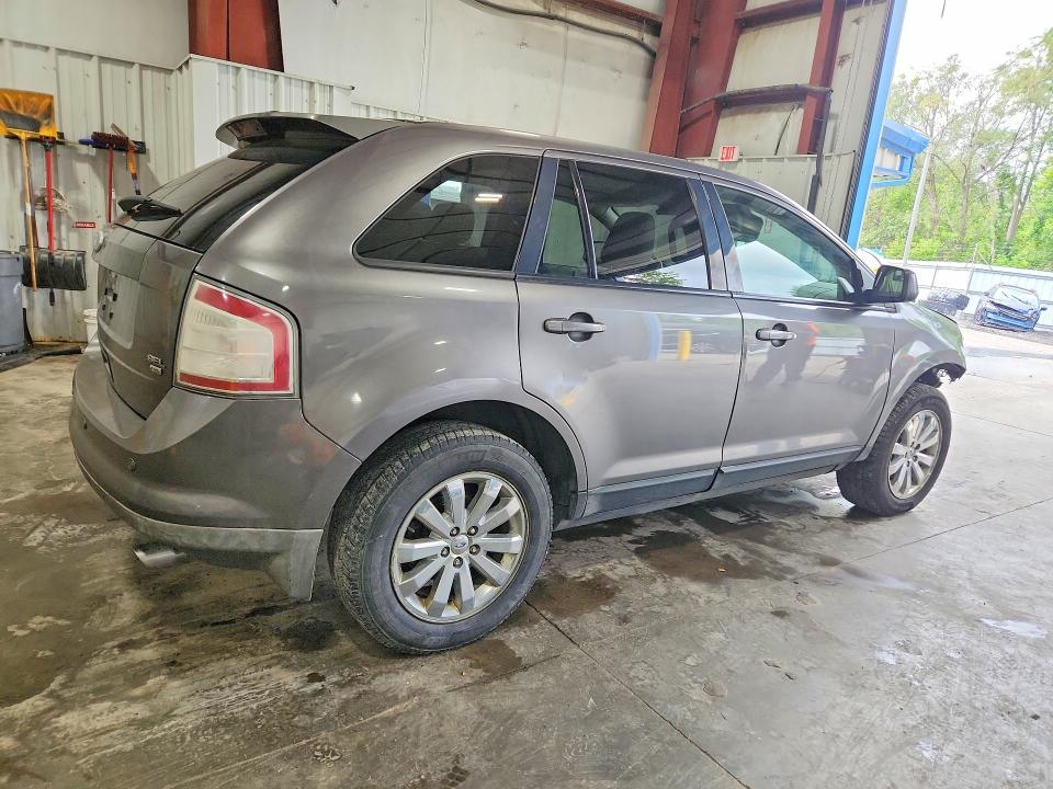 Photo 3 from auction – 2010 FORD EDGE with VIN 2FMDK4JC3ABB61191