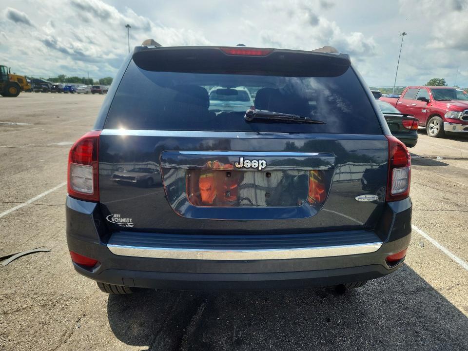 Photo 6 from auction – 2014 JEEP COMPASS with VIN 1C4NJCEA0ED889159