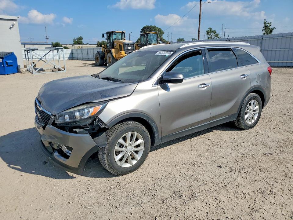 KIA SORENTO 2016 with VIN 5XYPG4A58GG111024 - Photo from auction