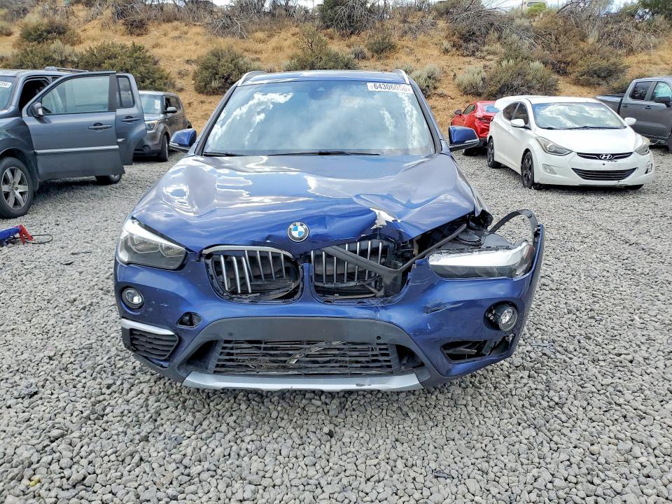 Photo 5 from auction – 2018 BMW X1 with VIN WBXHU7C30J3H43091
