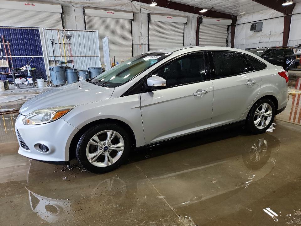 FORD FOCUS 2014 with VIN 1FADP3F23EL129594 - Photo from auction