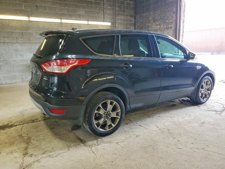 Photo 3 from auction – 2013 FORD ESCAPE with VIN 1FMCU9H96DUD80660
