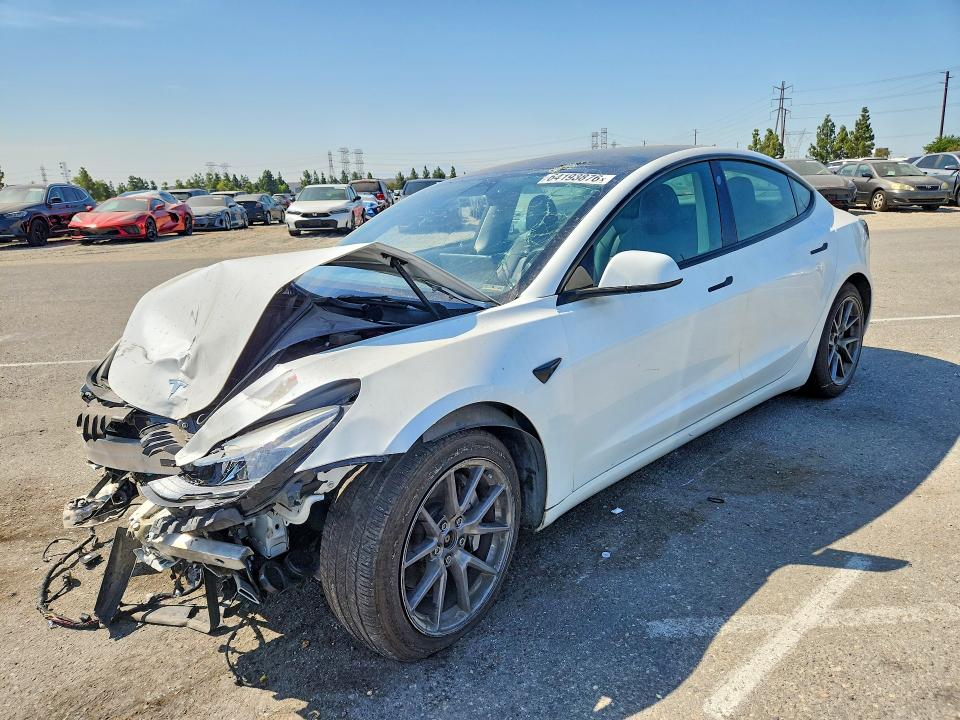 TESLA MODEL 3 2022 with VIN 5YJ3E1EB8NF274702 - Photo from auction