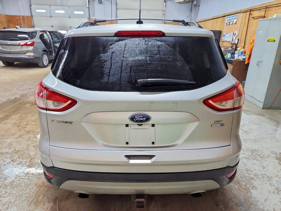 Photo 6 from auction – 2016 FORD ESCAPE with VIN 1FMCU9G99GUB36202