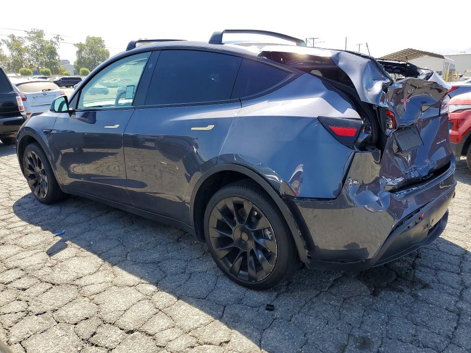 Снимка 2 от търг – 2023 TESLA MODEL Y с VIN 7SAYGDEE9PF868166