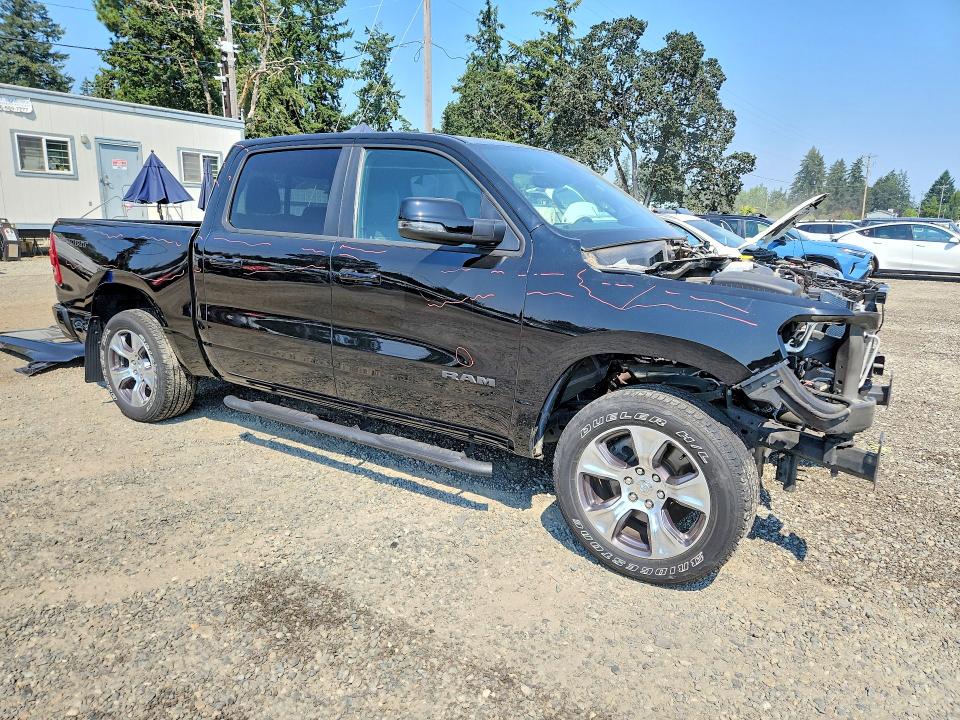 Photo 4 from auction – 2023 RAM 1500 with VIN 1C6SRFJT6PN636274