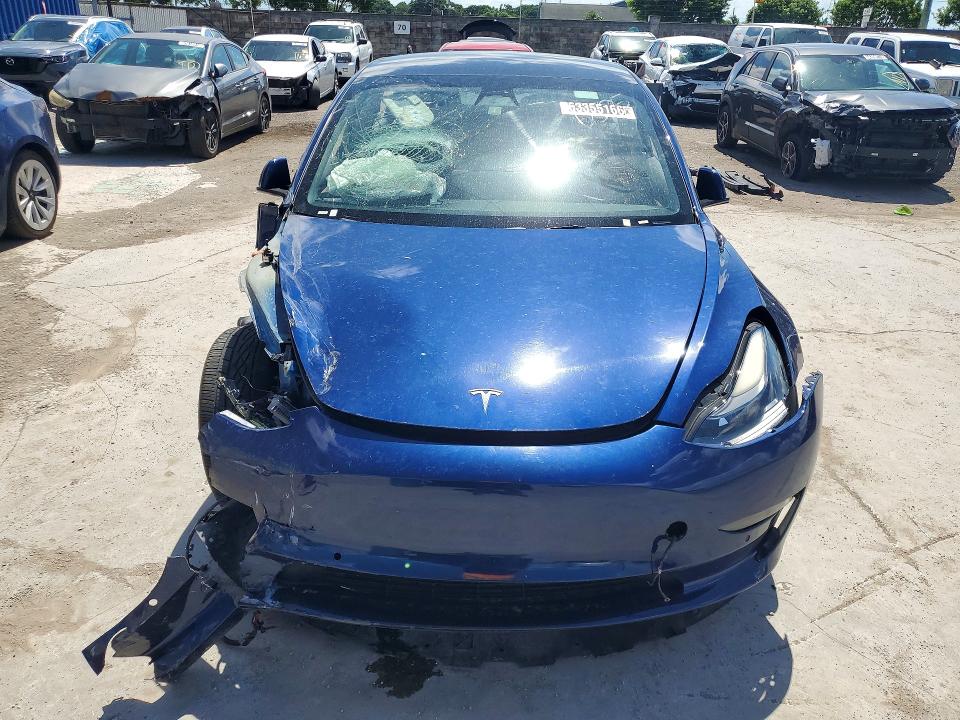 Photo 5 from auction – 2022 TESLA MODEL 3 with VIN 5YJ3E1EA2NF290305