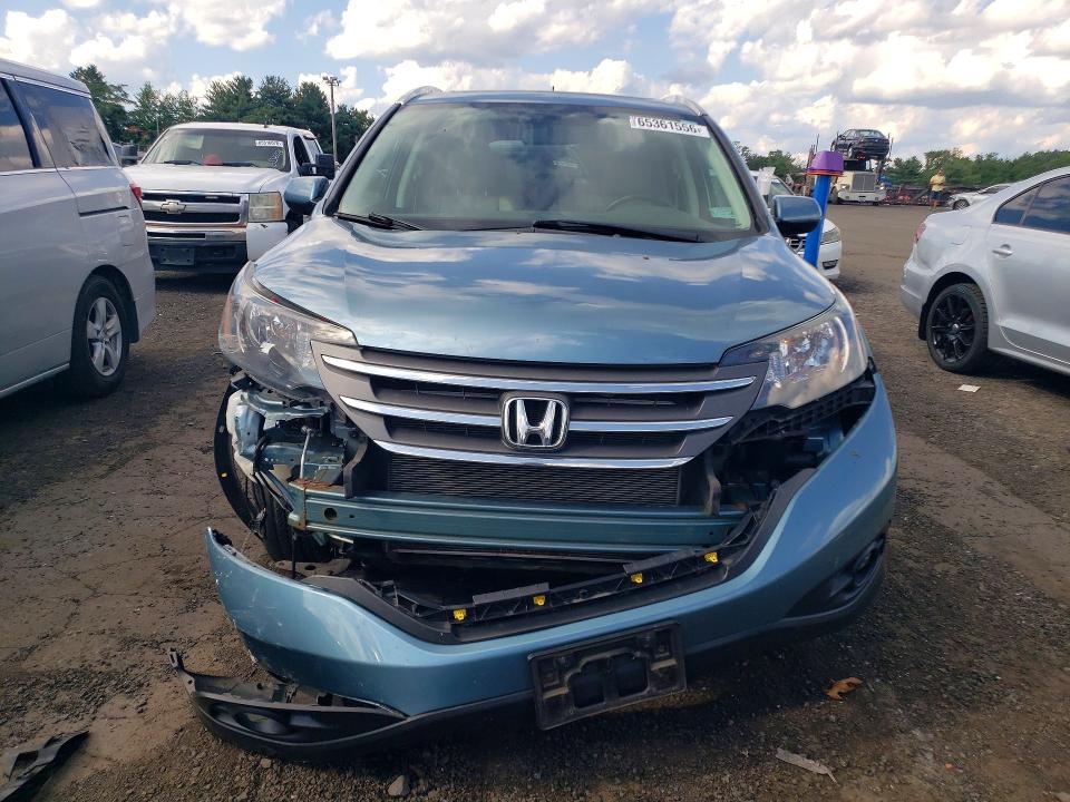 Photo 5 from auction – 2014 HONDA CR-V with VIN 2HKRM4H74EH612930