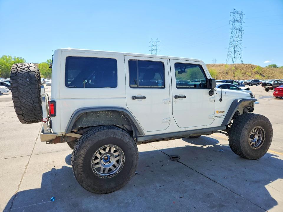 Снимка 3 от търг – 2011 JEEP WRANGLER UNLIMITED с VIN 1J4HA5H11BL574984