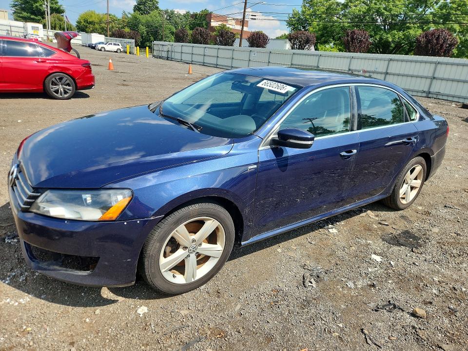 VOLKSWAGEN PASSAT 2014 with VIN 1VWAT7A32EC058921 - Photo from auction