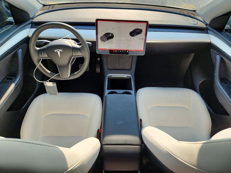 Photo 8 from auction – 2023 TESLA MODEL Y with VIN 7SAYGAEE3PF647953