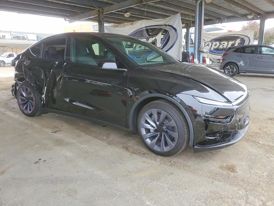 Photo 4 from auction – 2026 TESLA MODEL Y with VIN 7SAYGAEE8TF648994