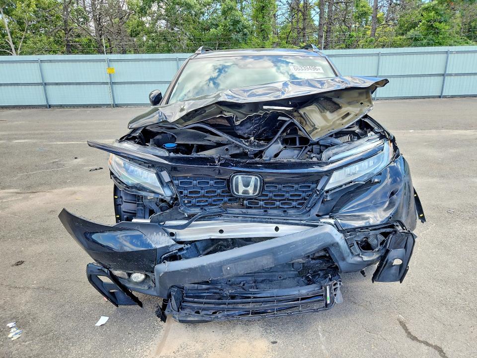 Photo 5 from auction – 2019 HONDA PASSPORT with VIN 5FNYF8H06KB024179