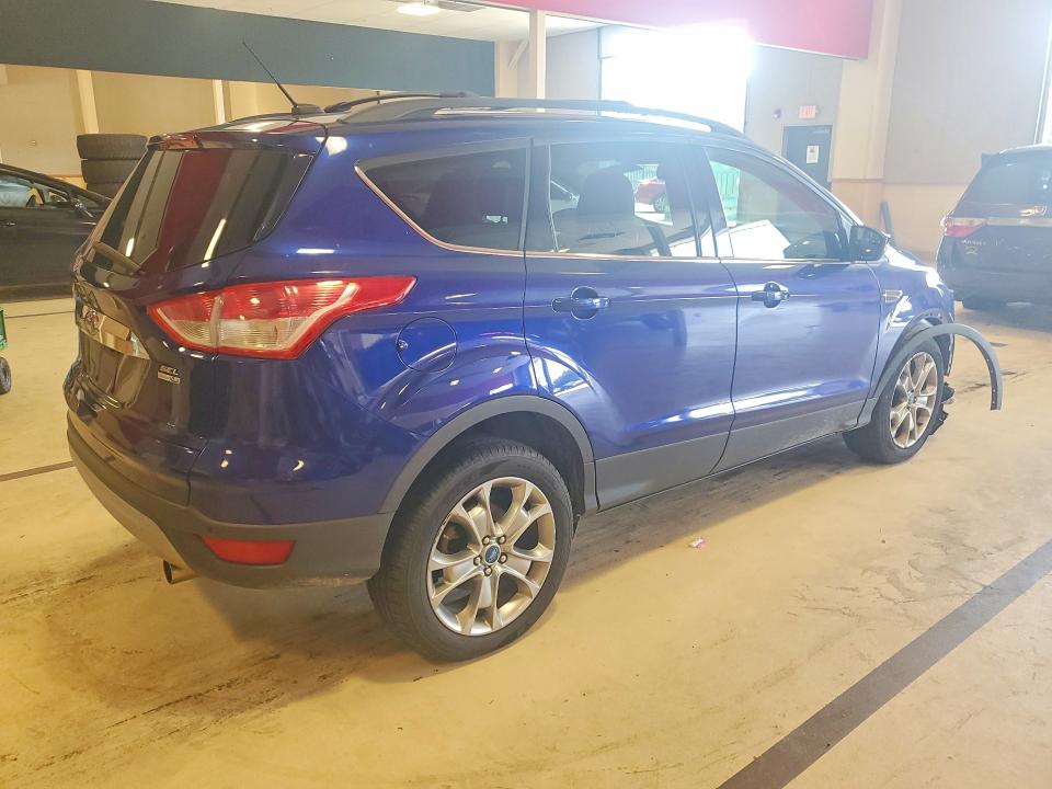 Photo 3 from auction – 2013 FORD ESCAPE with VIN 1FMCU9HX7DUB67862