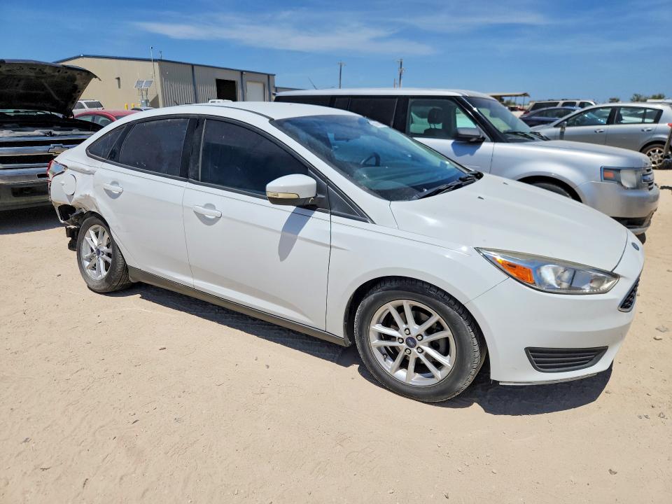 Photo 4 from auction – 2016 FORD FOCUS with VIN 1FADP3F23GL351118
