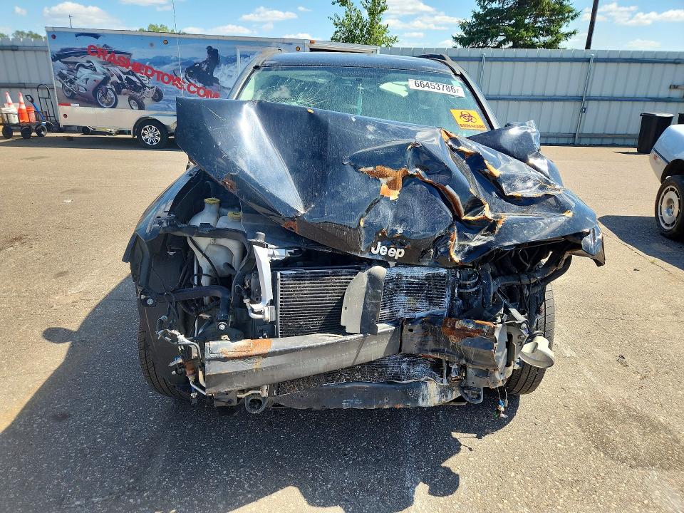 Photo 5 from auction – 2016 JEEP COMPASS with VIN 1C4NJCEA9GD744219