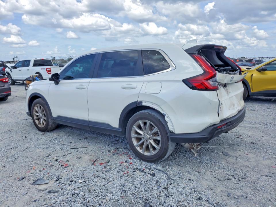 Photo 2 from auction – 2023 HONDA CR-V with VIN 2HKRS4H7XPH427466
