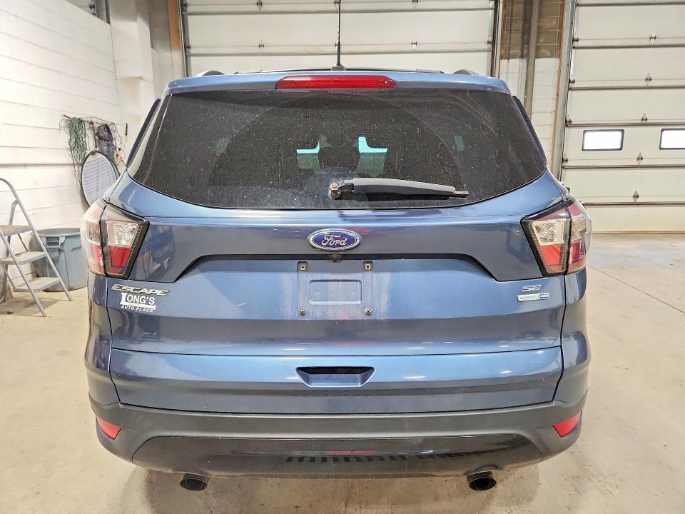 Photo 6 from auction – 2018 FORD ESCAPE with VIN 1FMCU9GD6JUA27000