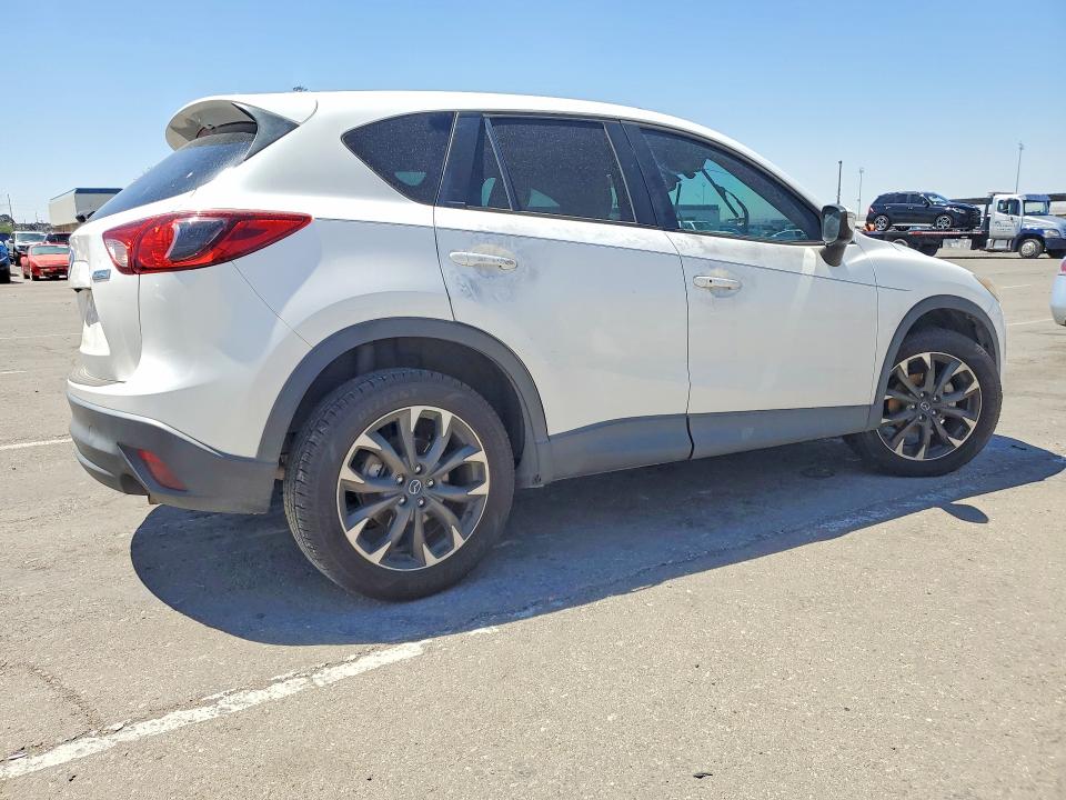 Photo 3 from auction – 2016 MAZDA CX-5 with VIN JM3KE2DY5G0750291
