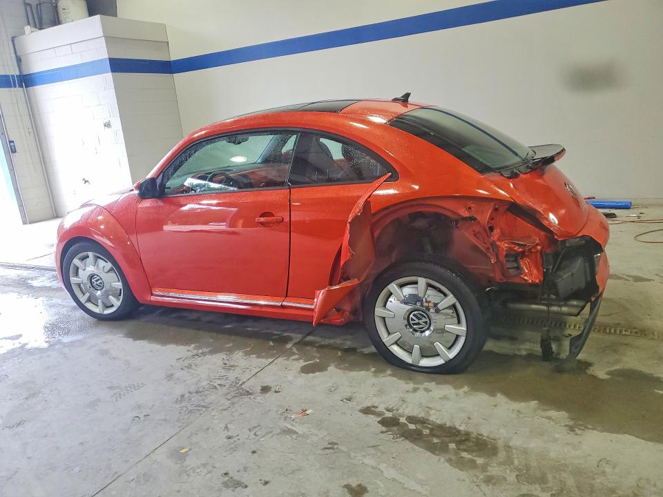Photo 2 from auction – 2016 VOLKSWAGEN BEETLE with VIN 3VWJ17AT5GM617773
