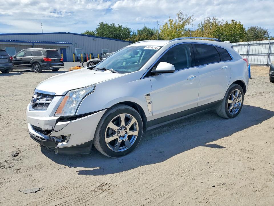 CADILLAC SRX 2011 with VIN 3GYFNCEYXBS624485 - Photo from auction