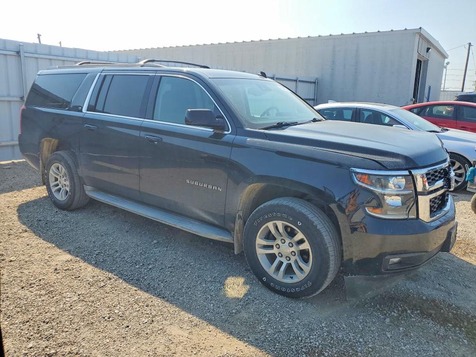 Photo 4 from auction – 2015 CHEVROLET SUBURBAN with VIN 1GNSKJKC9FR141998